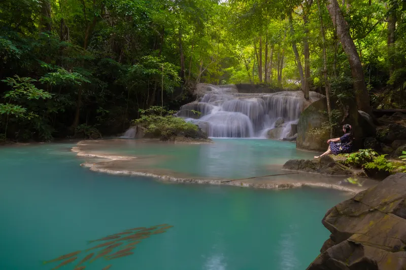 A turquoise waterfall tier at Erawan National Park